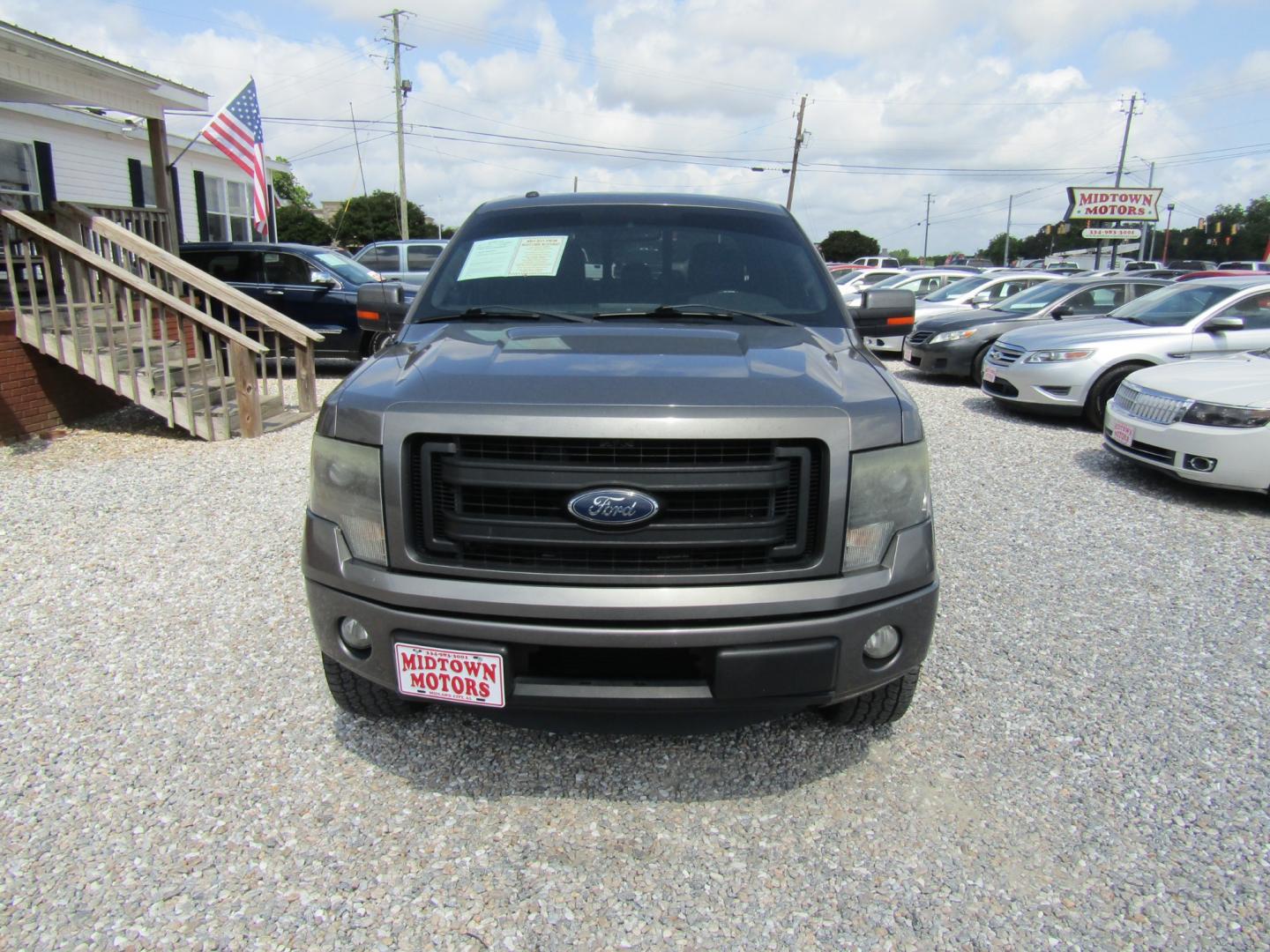 2013 Gray /Gray Ford F-150 Platinum SuperCrew 6.5-ft. Bed 2WD (1FTFW1CTXDF) with an 3.5L V6 TURBO engine, Automatic transmission, located at 15016 S Hwy 231, Midland City, AL, 36350, (334) 983-3001, 31.306210, -85.495277 - Photo#1